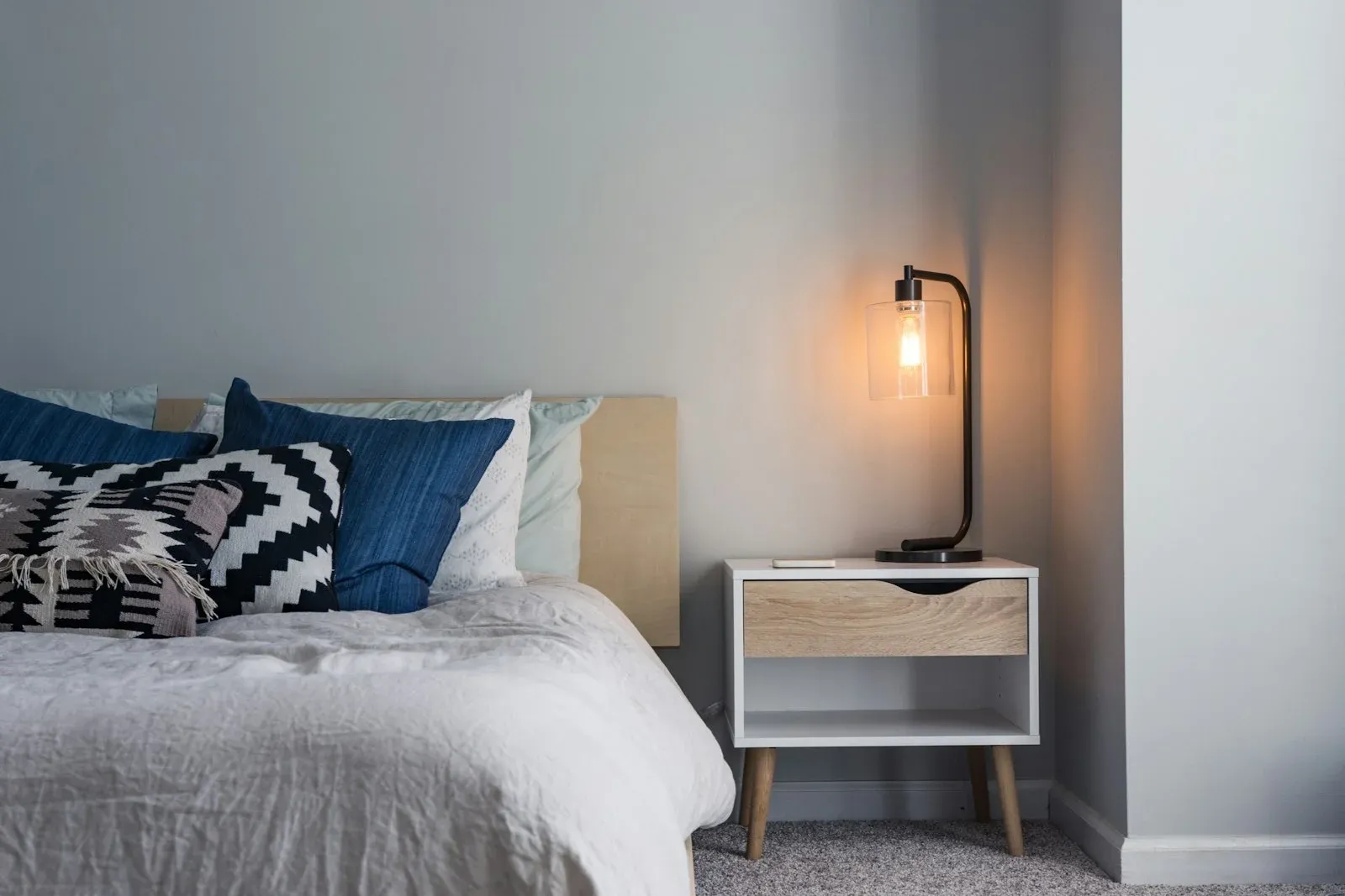 Low platform bed with upholstered surround