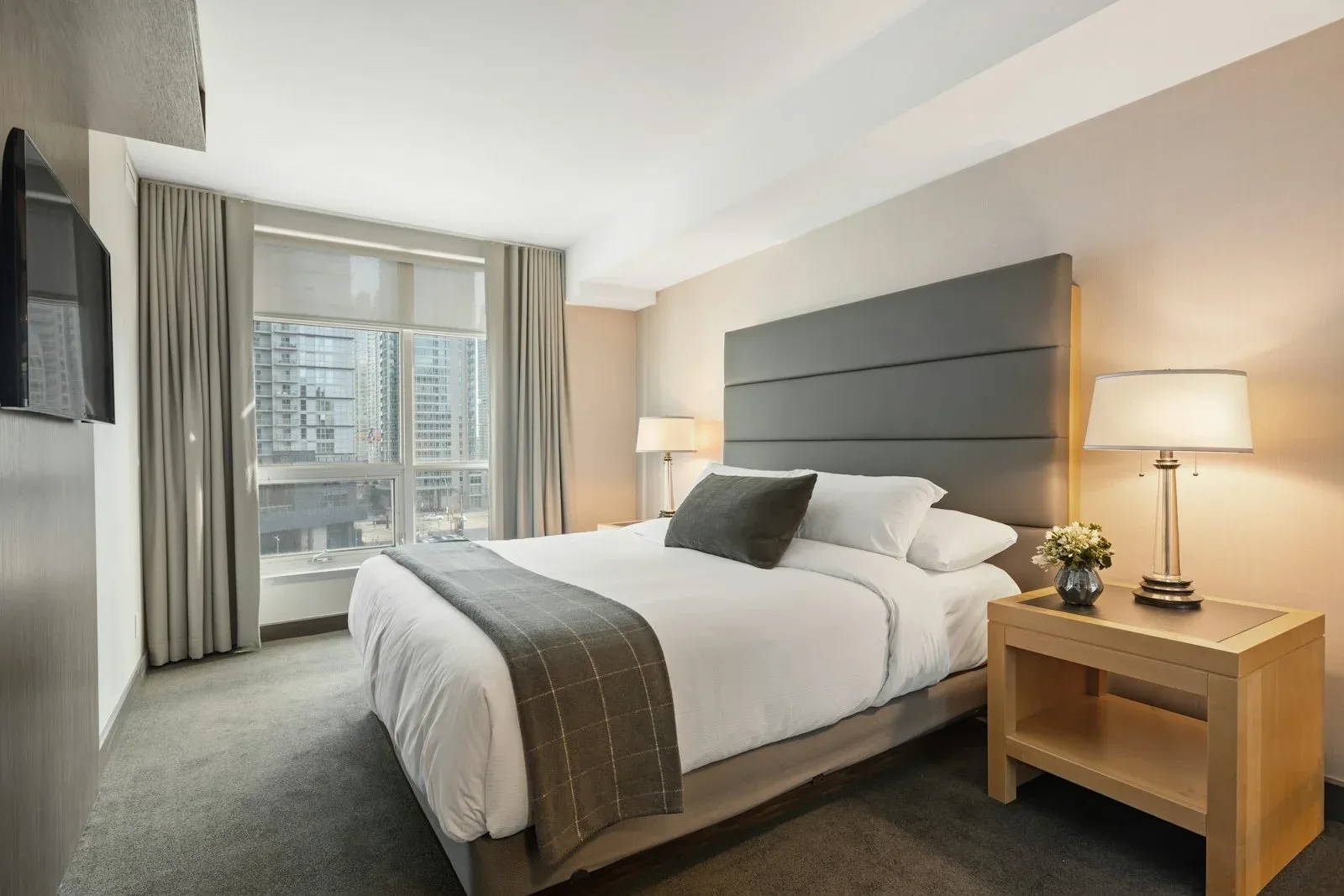 Neutral linen-blend fabric on an upholstered bed