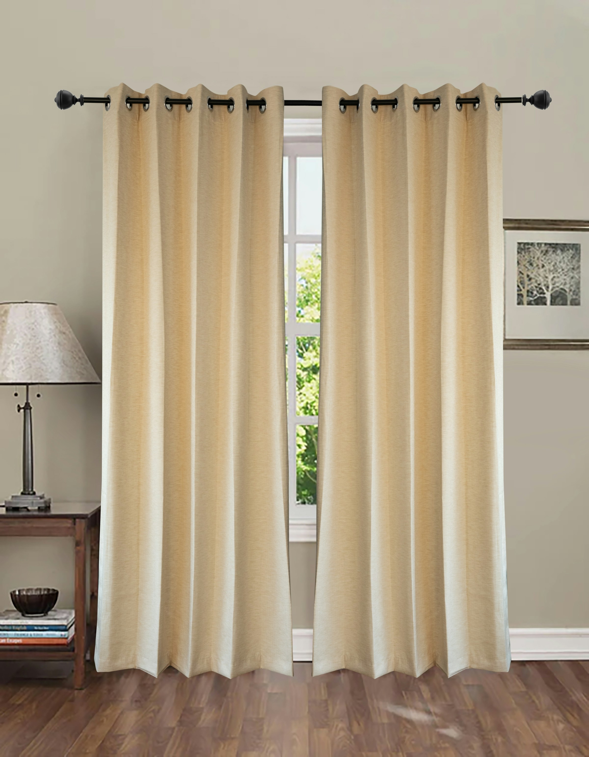 Floor-length curtains framing a bright window