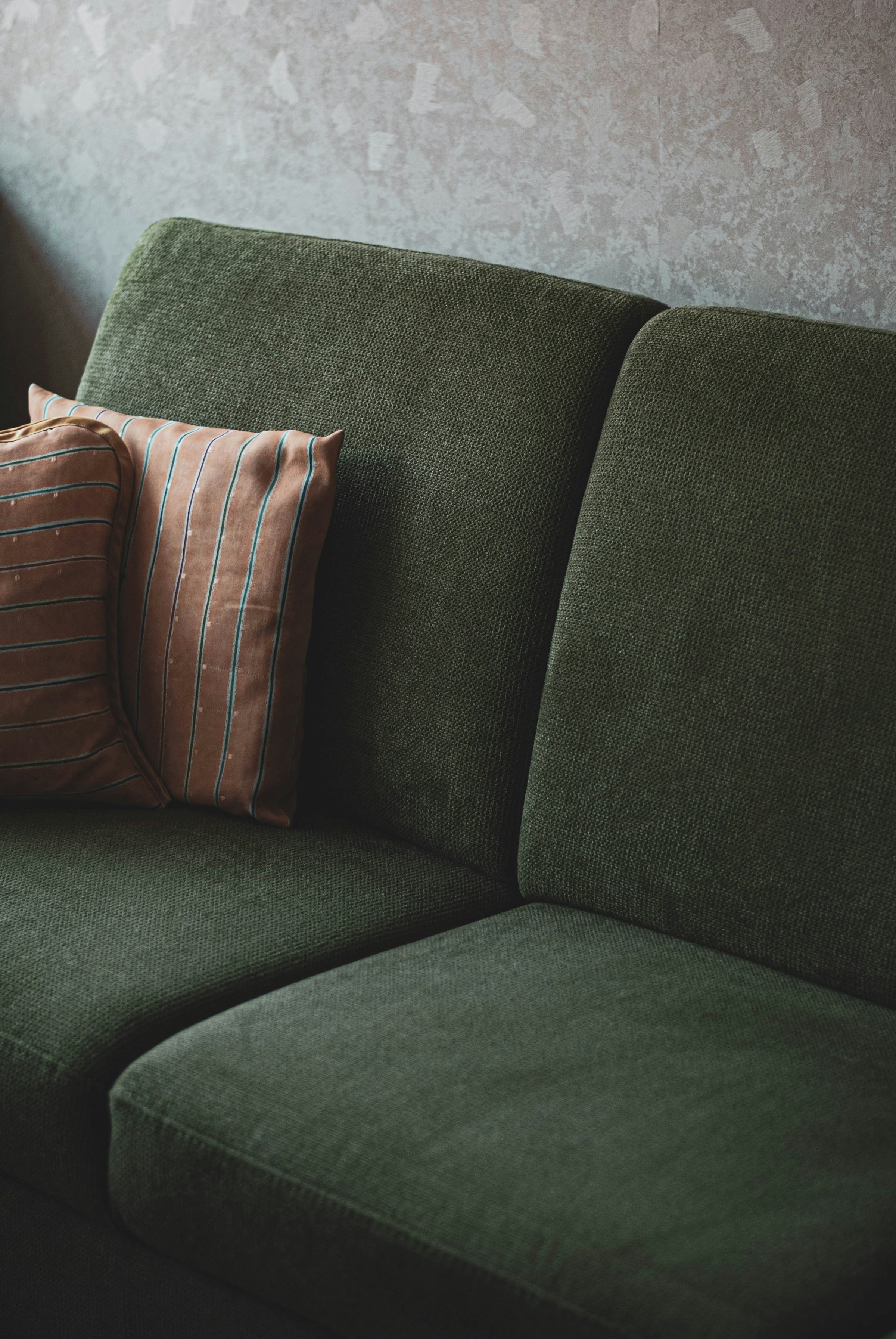 Close-up of newly upholstered sofa cushions in woven fabric