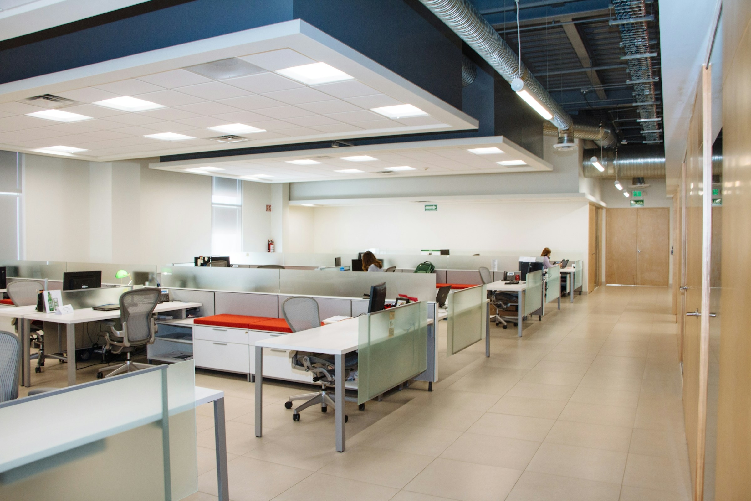 Open-plan office fitted with desks and task chairs
